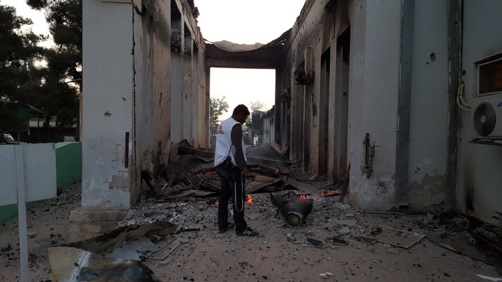 An MSF staffer surveys the damage following the U.S. military's strikes on the Kunduz trauma center on Oct. 3. The ICU was th