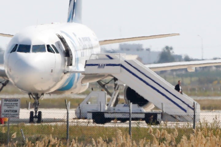 The passengers and crew onboard an EgyptAir plane, which was hijacked and forced to land in Cyprus, were freed unharmed and the hijacker was arrested.