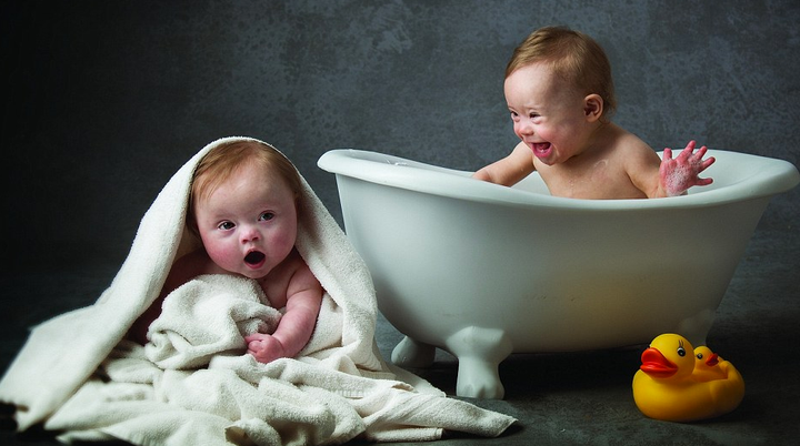 Eliza (L) and Jorja (R) re-enacting bathtime