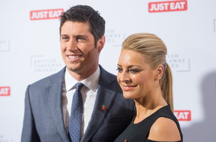Vernon Kay with his wife Tess Daly, whom he says is completely aware of his recent communications with glamour model Rhian Sugden