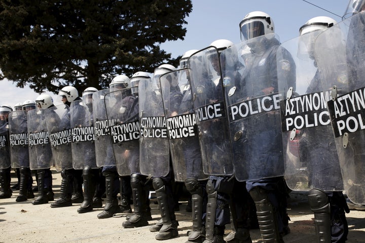 Greek police officers stood guard after the scuffles in Idomeni. 