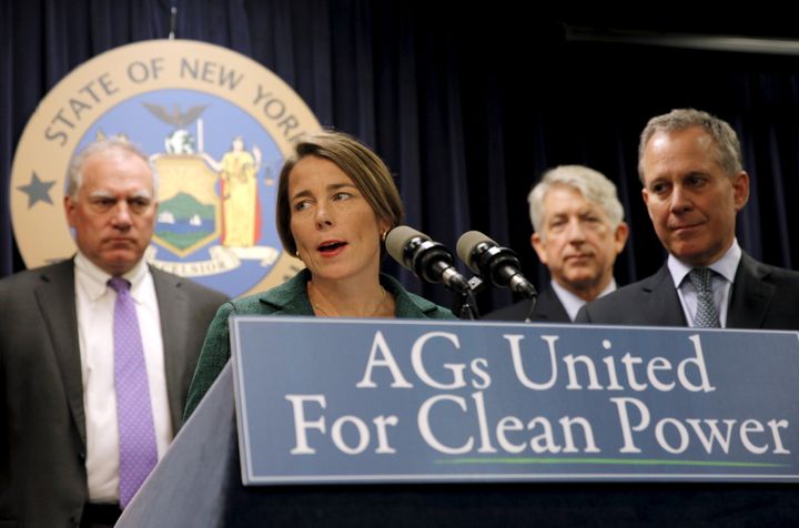 Massachusetts Attorney General Maura Healey, center, New York Attorney General Eric Schneiderman, right, and other U.S. state attorneys general announced a state-based effort to investigate companies over climate fraud.