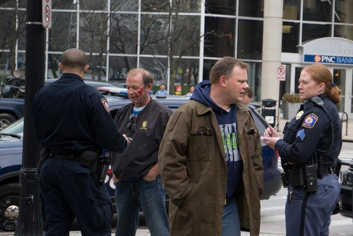 Grand Rapids Police confirmed to HuffPost that the man in the photo with blood on his face is the man shouting "kill all Muslims!" on video. Police believe he was in the instigator in an incident that took place Sunday.