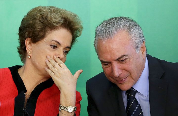 Brazil's President Dilma Rousseff (L) talks to Vice President Michel Temer at the Planalto Palace in Brasilia, Brazil, in this March 2, 2016 file photo.