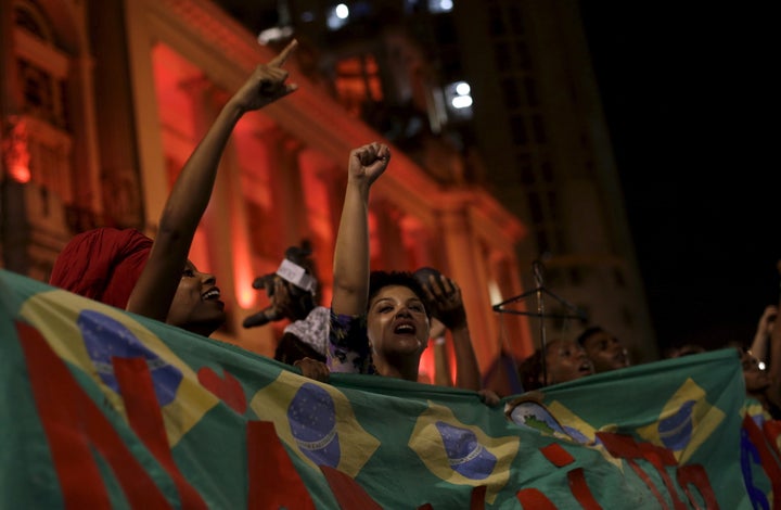 Women perform during a theatrical play at the "Fest for Democracy" culture and political event against impeachment proceedings against Brazil's President Dilma Rousseff in Rio de Janeiro, Brazil, March 24, 2016.