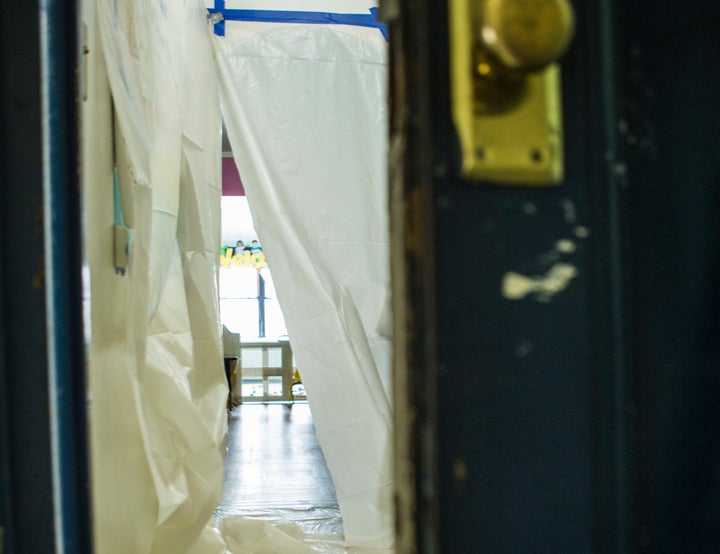 An in-home day care in New York City is sealed off before contractors proceed with lead paint abatement. In 2012, NYC ho