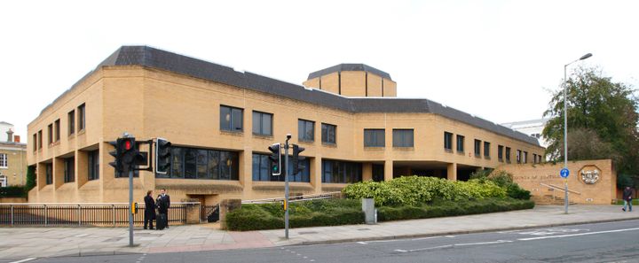 Billy Midmore is on trial at Southampton Crown Court (above) accused of throwing acid at a woman's face