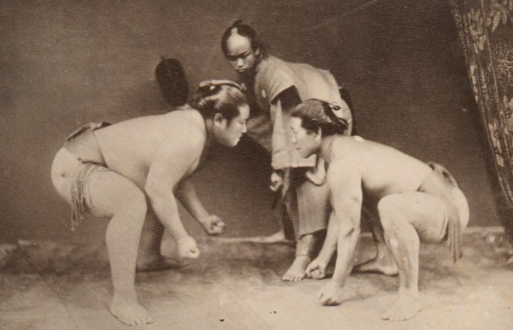 To win a fight, a sumo wrestler must push, slap or body throw until his opponent is out of the ring or part of his rival's bo