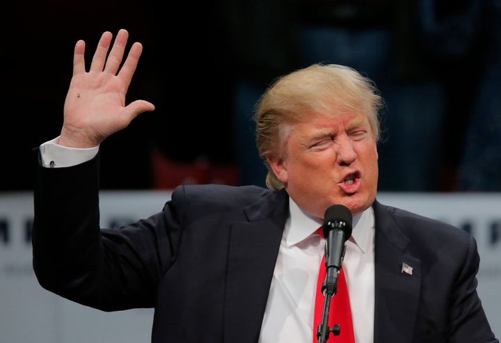 Donald Trump gestures as he speaks during a campaign event in Concord, North Carolina March 7, 2016