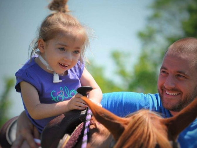 <strong>Faith with her father Mic</strong>