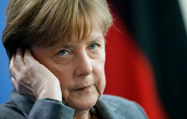 German Chancellor Angela Merkel adjusts her earphones as she addresses a news conference following her talks with Croatian Prime Minister Tihomir Oreskovics at the Chancellery in Berlin, Germany, March 1, 2016