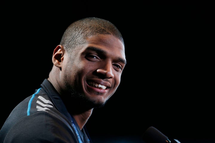 The 26-year-old athlete said he's been the victim of "terrible" racism in the gay community.