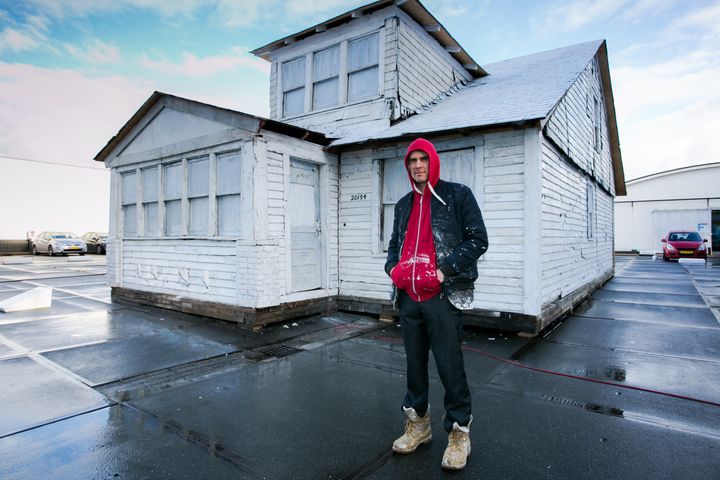 "The White House," by Ryan Mendoza, was on view at the Art Rotterdam festival in the Netherlands in February. Mendoza removed the facade of an abandoned house in Detroit for his installation, prompting criticism about how it affected the neighborhood it came from.