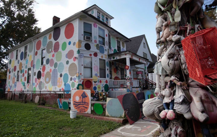 An occupied house painted with polka dots, shown in 2013, is part of artist Tyree Guyton's ongoing Heidelberg Project installation in Detroit. 