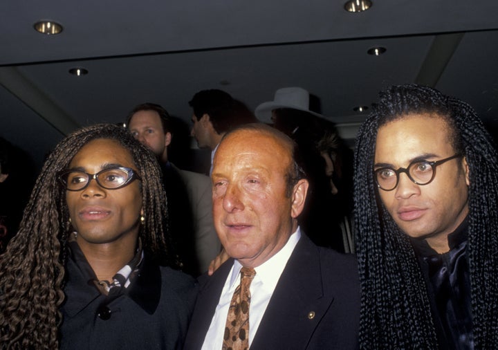 Rob Pilatus and Fab Morvan of Milli Vanilli and Clive Davis attend Arista Records Pre-Grammy Awards Party on February 20, 1990 at the Beverly Hills Hotel in Beverly Hills, California.