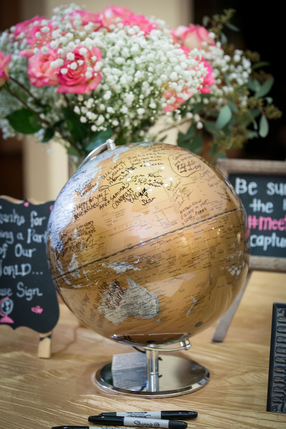 Love to travel? Have your guests sign a globe.
