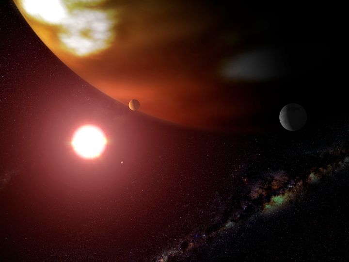 An artist's concept of a gas giant planet orbiting the cool, red dwarf star Gliese 876