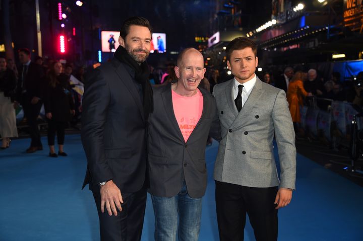 Eddie Edwards shares the spotlight with the stars of his film, Hugh Jackman and Taron Egerton