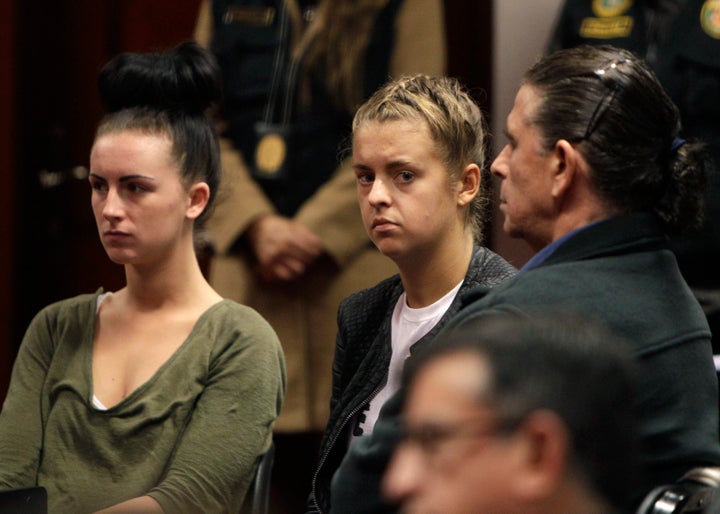 <strong>McCollum and Reid seen after their arrest</strong>