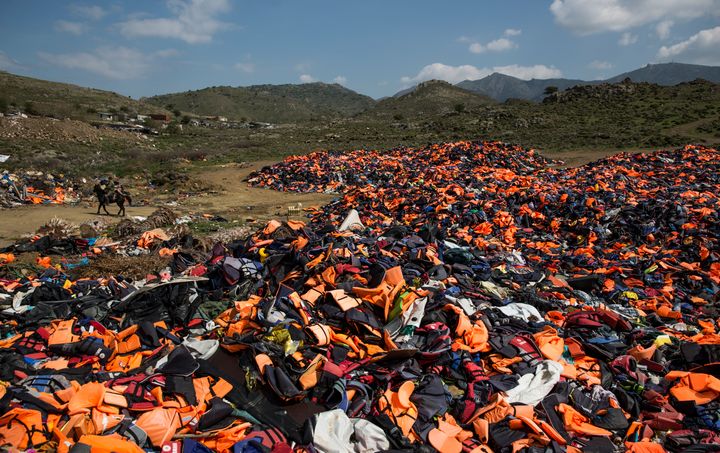 In 2015, 856,000 people crossed the Aegean Sea to Greece in rickety boats. Here, thousands of life vests discarded after crossing the Aegean Sea are seen on the Greek island of Lesbos.