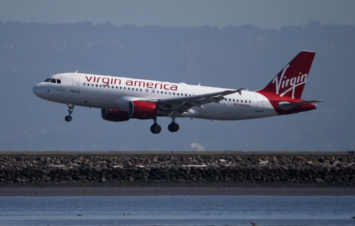 A Virgin America plane lands at San Francisco International Airport on March 29, 2016 in Burlingame, California.