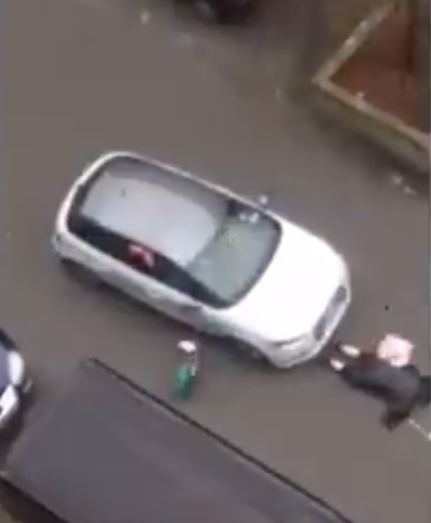 The woman is shunted off the vehicle before it drives off