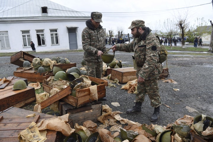 Armenian volunteers make preparations before making their way to Nagorno-Karabakh region, which is controlled by separatist Armenians, where clashes with Azeri forces are taking place, in Yerevan, Armenia, April 3, 2016.