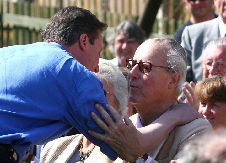 David Cameron (left) greeting his father Ian (right) during the 2010 General Election campaign