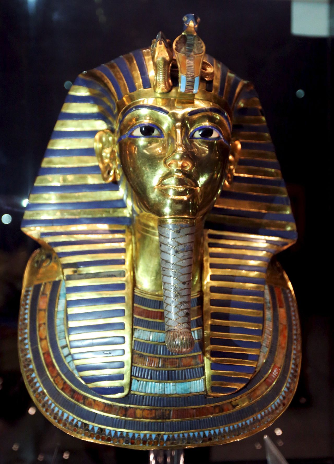 The golden mask of King Tutankhamun is displayed inside a glass cabinet at the Egyptian Museum in Cairo, Egypt