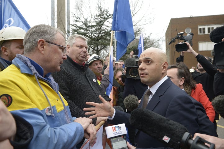 Business Secretary Sajid Javid talks to workers as he leaves Tata Steel in Port Talbot last week