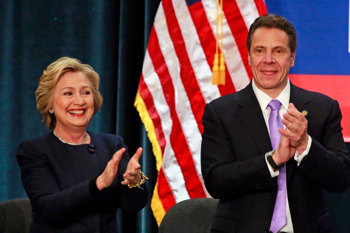 U.S. Democratic presidential candidate Hillary Clinton and New York Gov. Andrew Cuomo at a rally to celebrate the state of New York passing a $15 minimum wage on Monday.