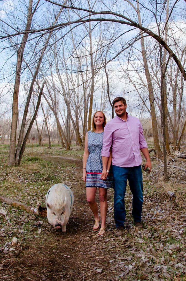 Kristin Hartness and Jay Yontz featured their pet pig in their engagement photos.