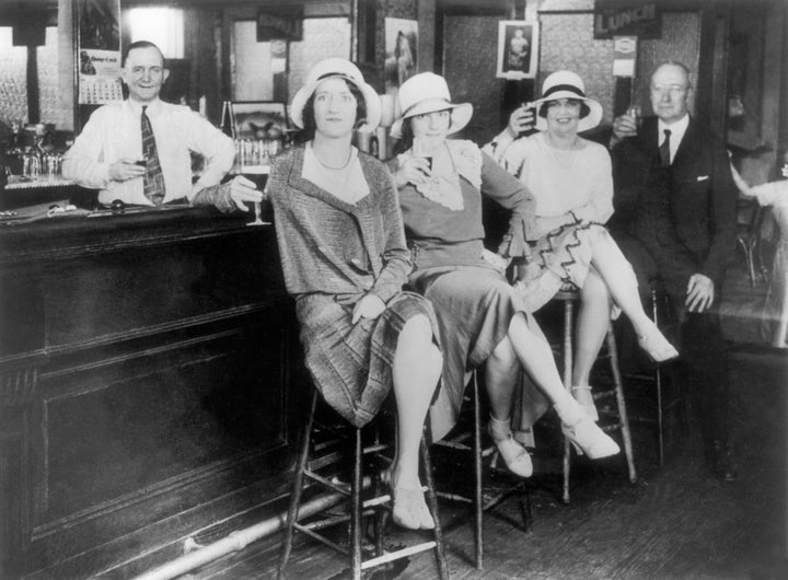 If Prohibition taught us anything, it's that drinkers will always find a way to drink. Here, a group of rebels drink at an illegal New York "speakeasy" in 1932.