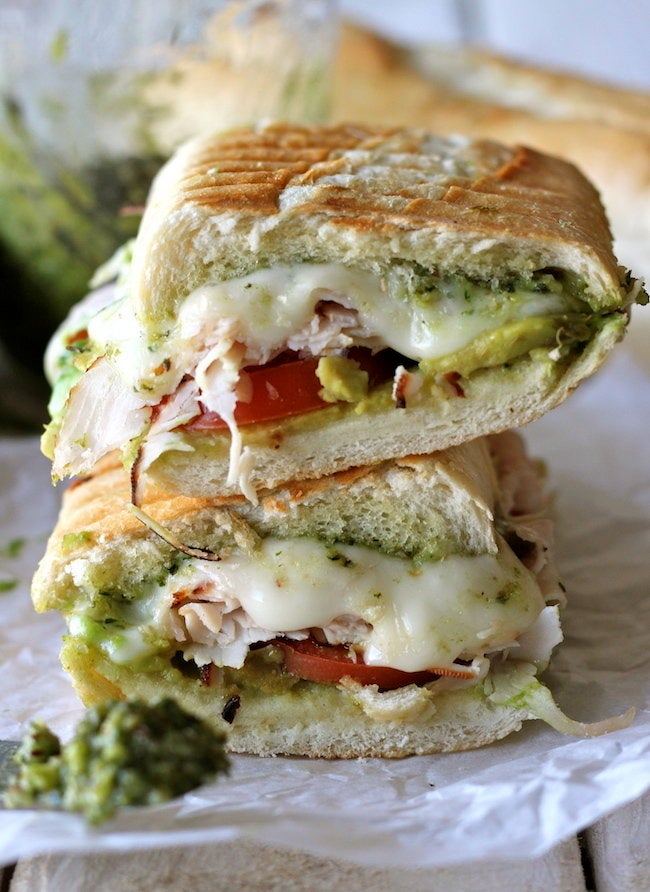 Get the <a href="http://damndelicious.net/2012/11/21/leftover-thanksgiving-turkey-pesto-panini/" target="_blank" data-beacon="{"p":{"mnid":"entry_text","lnid":"citation","mpid":0}}">Turkey Pesto Panini recipe</a> from Damn Delicious.