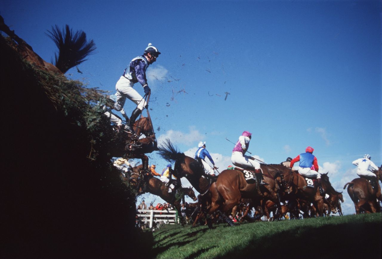 A jockey is thrown from his mount at the notorious Canal Turn during the 1989 Grand National held at Aintree Race.