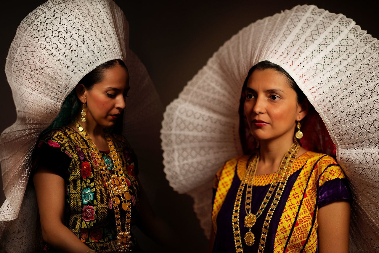 Tehuana women wearing their traditional headdress. The Tehuana-style of clothes was popularized by Mexican icon Frida Kahlo.
