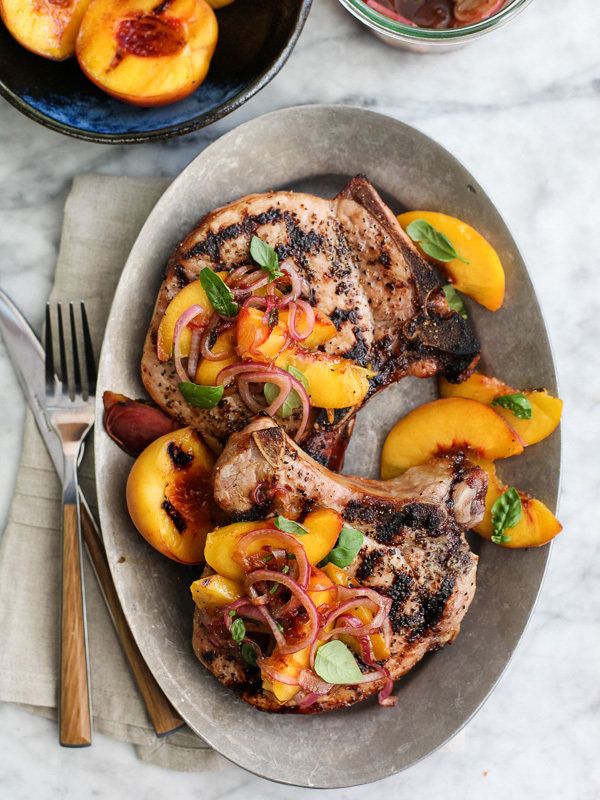 Get the Grilled Pork Chops with Spicy Balsamic Grilled Peaches recipe from Foodie Crush.