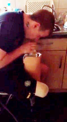 He then uses a plastic bottle fashioned into a funnel to inhale the substance