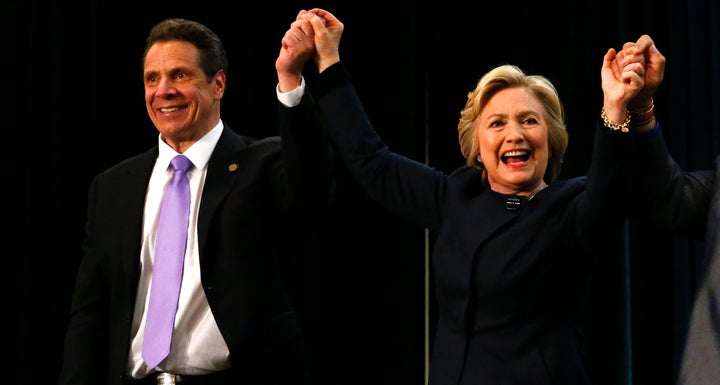 Hillary Clinton joined New York Gov. Andrew Cuomo (D) during a victory rally for the passage of a $15 minimum wage and paid f