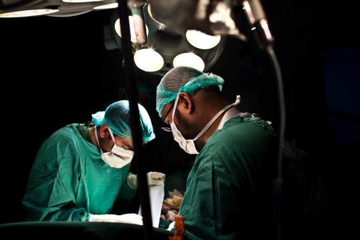 The MSF hospital in Kunduz was the only facility that offered specialized trauma surgery in all of northern Afghanistan, Thomas noted. Surgeons operate on a man at the MSF hospital in Kunduz in Dec. 2011.