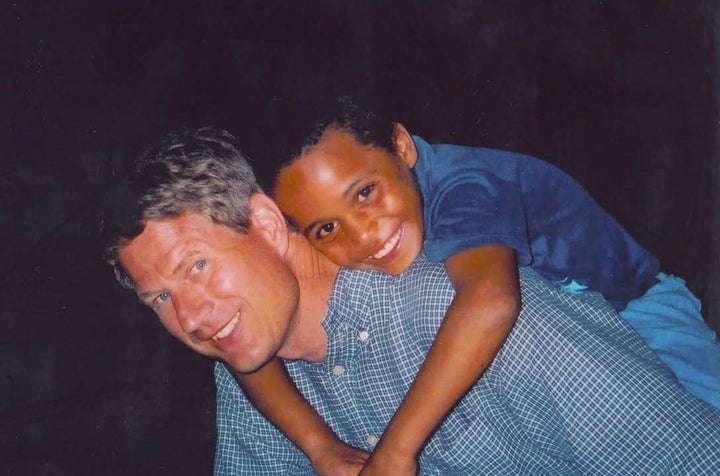 Kelvin with John Lewis during a trip to Mozambique.