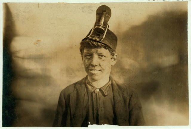 This 1906 photo shows Frank, a 14-year-old boy who worked in a mine helping his father pick and load coal for three years. He was hospitalized at one point, after his leg was crushed by a coal car.