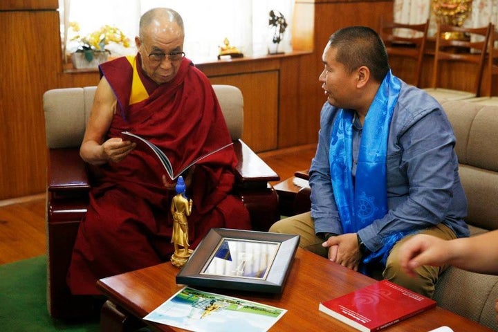 The Dalai Lama and M.BATAA, a member of the project's board of trustees and former Tibetan Buddhist monk, discuss p