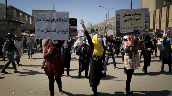 Women gather at a women's rights protest in Kabul, Afghanistan.