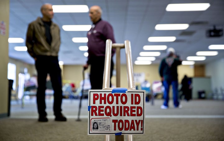 Some Wisconsin voters had a difficult time casting their ballot on primary day because of the state's photo ID law.