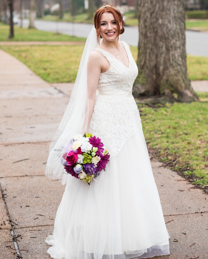 Bride Julia Cain wears the dress both her mother and grandmother previously wore for their weddings.