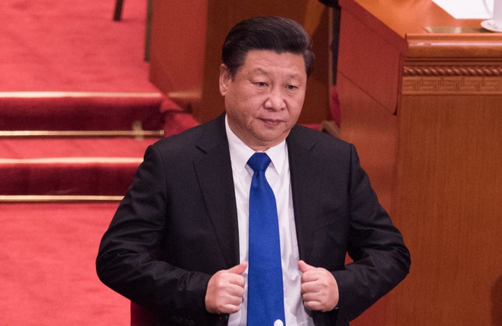 Chinese President Xi Jinping attends the opening session of the Fourth Session of the 12th National Committee of the Chinese People's Political Consultative Conference at the Great Hall of the People in Beijing on March 3, 2016