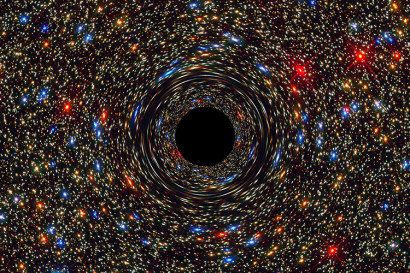 A computer-simulated image illustrates the gravitational pull of a supermassive black hole.