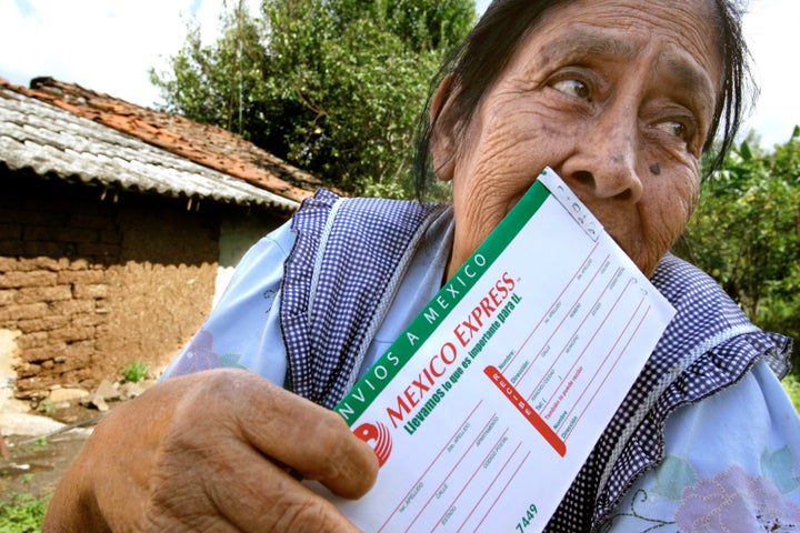 Guadalupe Vidales, 74, kisses the Mexico Express money order that just arrived from her son in Bakersfield, California. There are lots of ways to send remittances from the United States to Mexico.