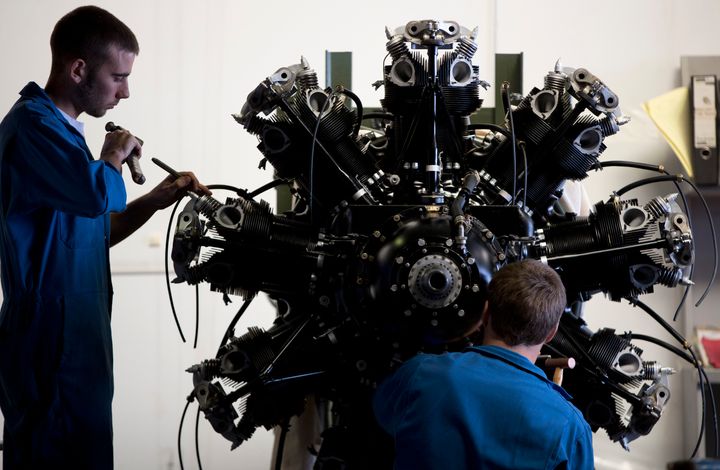 <strong>Apprentice engineers work on an aeroplane engine in this 2013 file photo</strong>